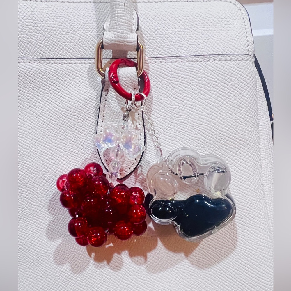 Buy 3 get 1 free.❤️❤️Elegant Red Heart And Liquid Foot Bag Charm with Bow Accent